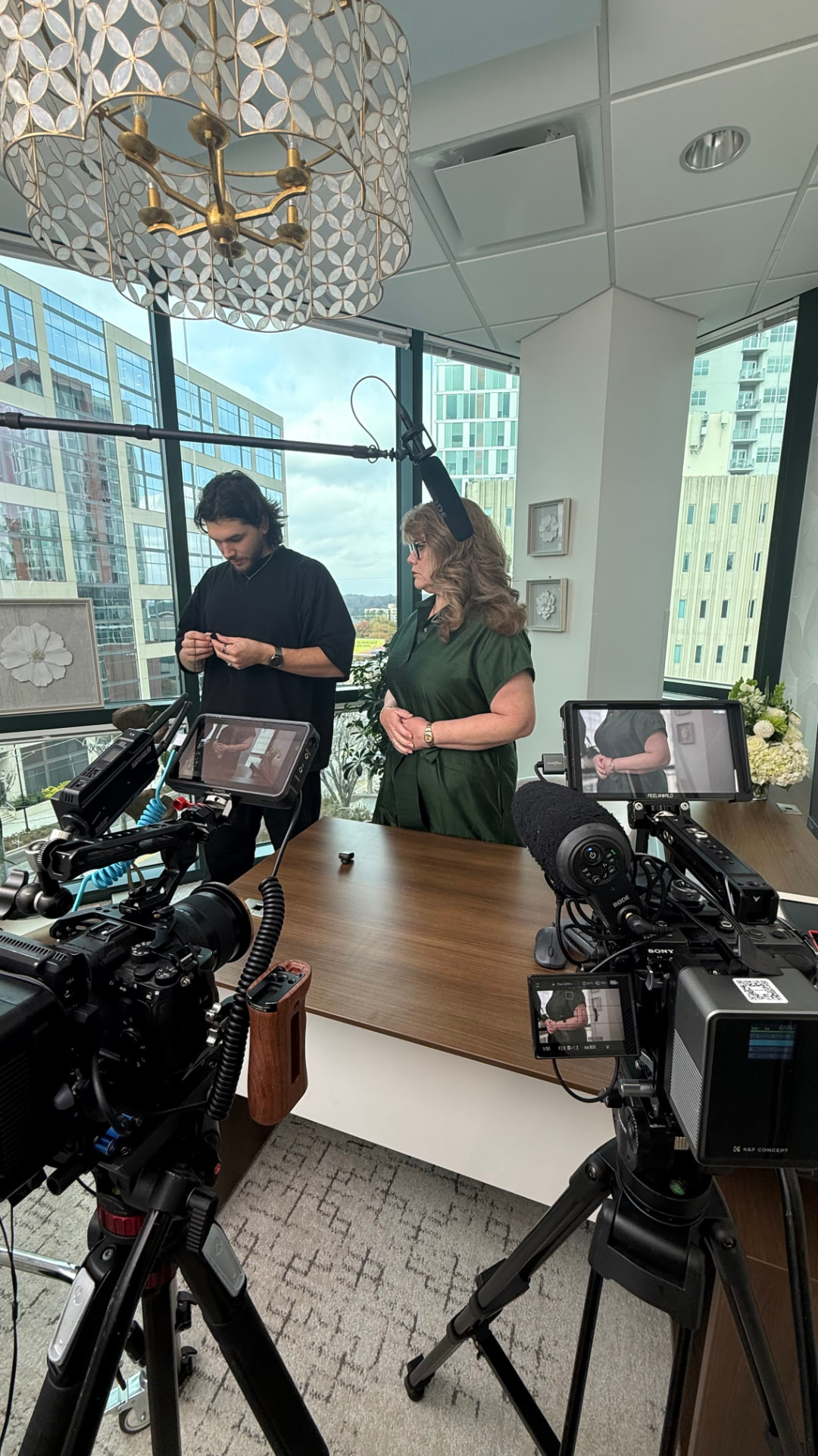 Focus Films crew setting up a two camera interview in a downtown office